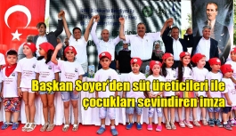 Başkan Soyer’den süt üreticileri ile çocukları sevindiren imza